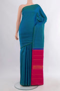 Pure Silk Pure Zari Peacock Blue Kanjivaram Saree with Stripes on the body and Thin Zari Line.  displayed on a mannequin