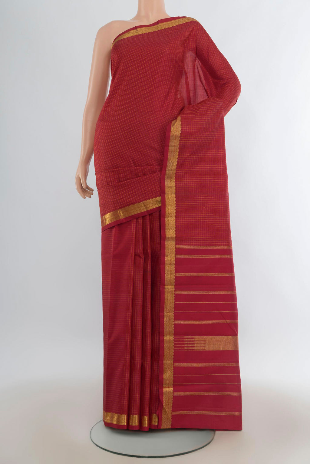 Pure Silk Red Kanjivaram Saree with Checked design on the body and Zari Border.  displayed on a mannequin