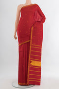 Red Kanchipuram Silk Saree with Thread Butta on the body and Silk Border.  displayed on a mannequin