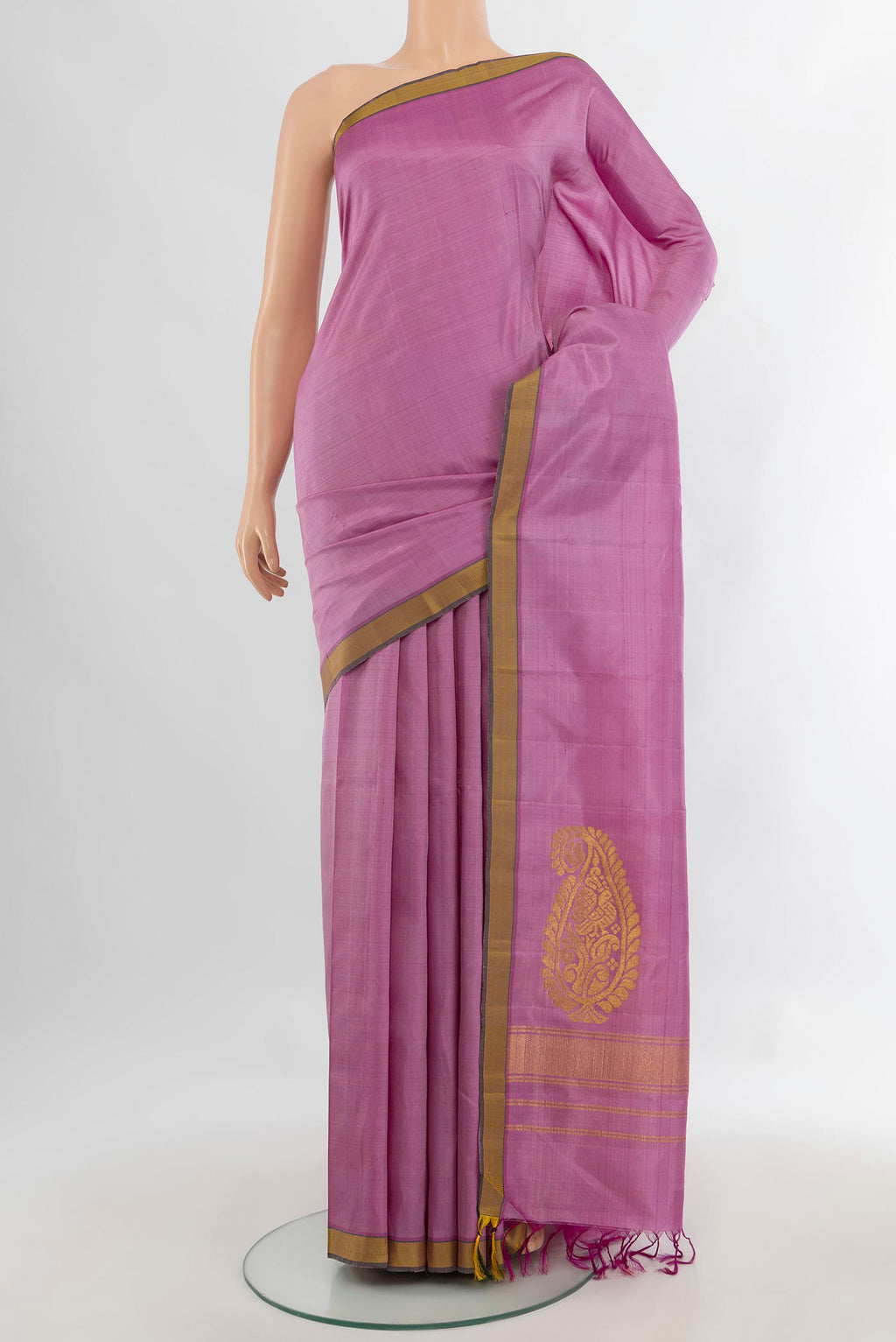 Pure Silk Rose pink Kanchipuram Saree with Plain Body and Thread Border.  displayed on a mannequin