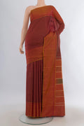 Pure Silk Maroon Kanchipuram Saree with Checked design on the body and Plain Border.  displayed on a mannequin