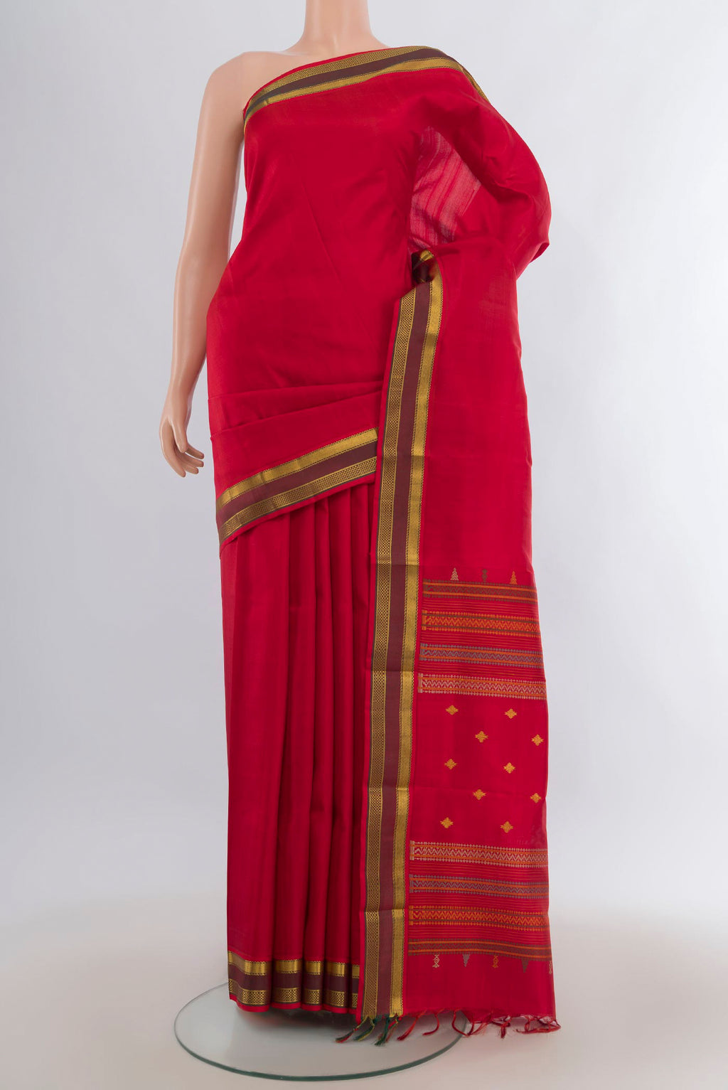 Pure Silk Red Kanchipuram Saree with Plain Body and Zari Border.  displayed on a mannequin