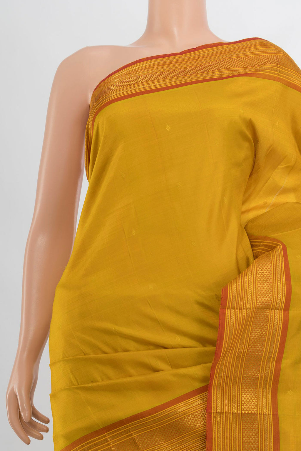 Border image of Pure Silk Mustard Kanchipuram Saree with Zari Butta on the body and Silk Border. 