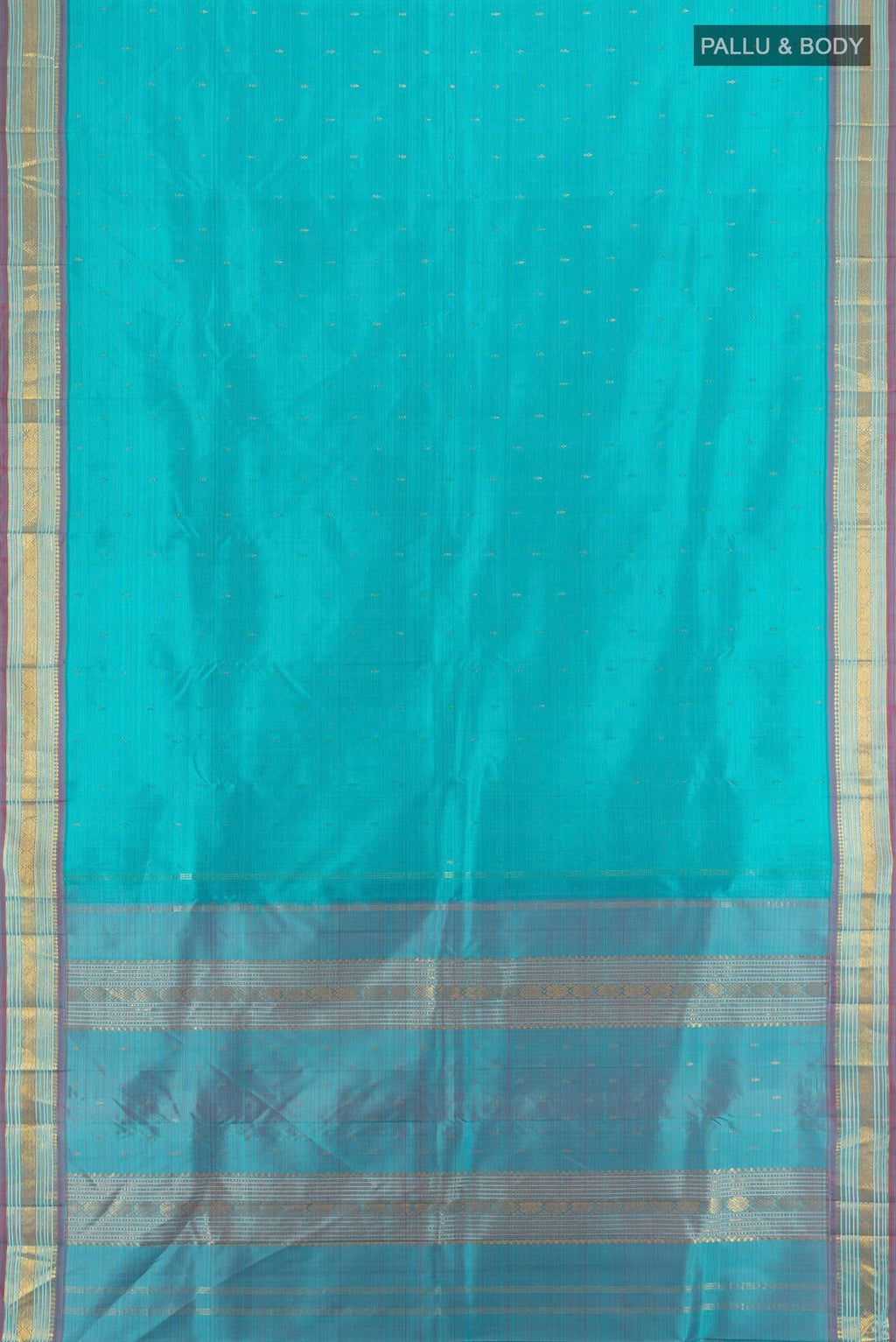 Flat view of Light Blue Kanchipuram Silk Saree with Zari Butta on the body and Zari Border. 