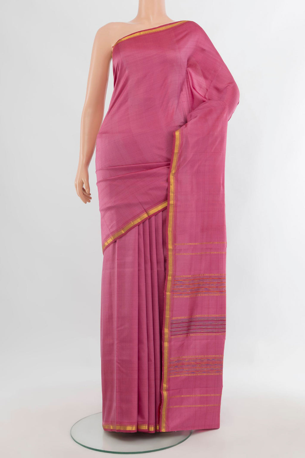 Pure Silk Pink Kanchipuram Saree with Plain Body and Zari Border.  displayed on a mannequin