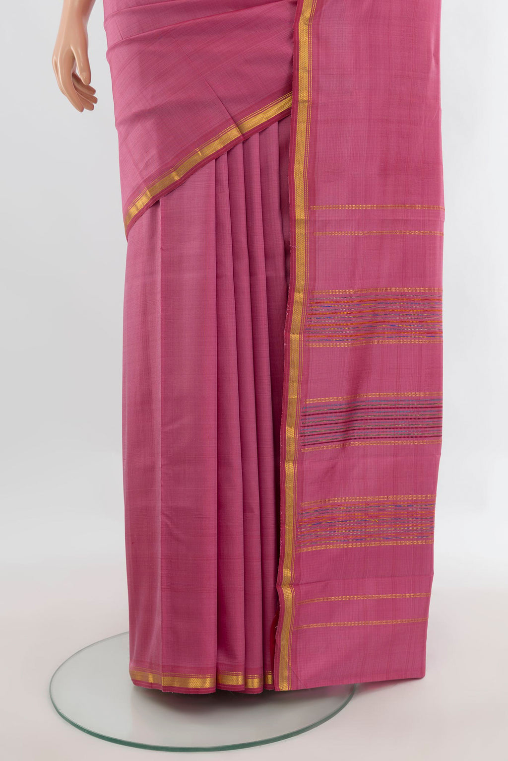 Pleats and pallu of Pure Silk Pink Kanchipuram Saree with Plain Body and Zari Border. 