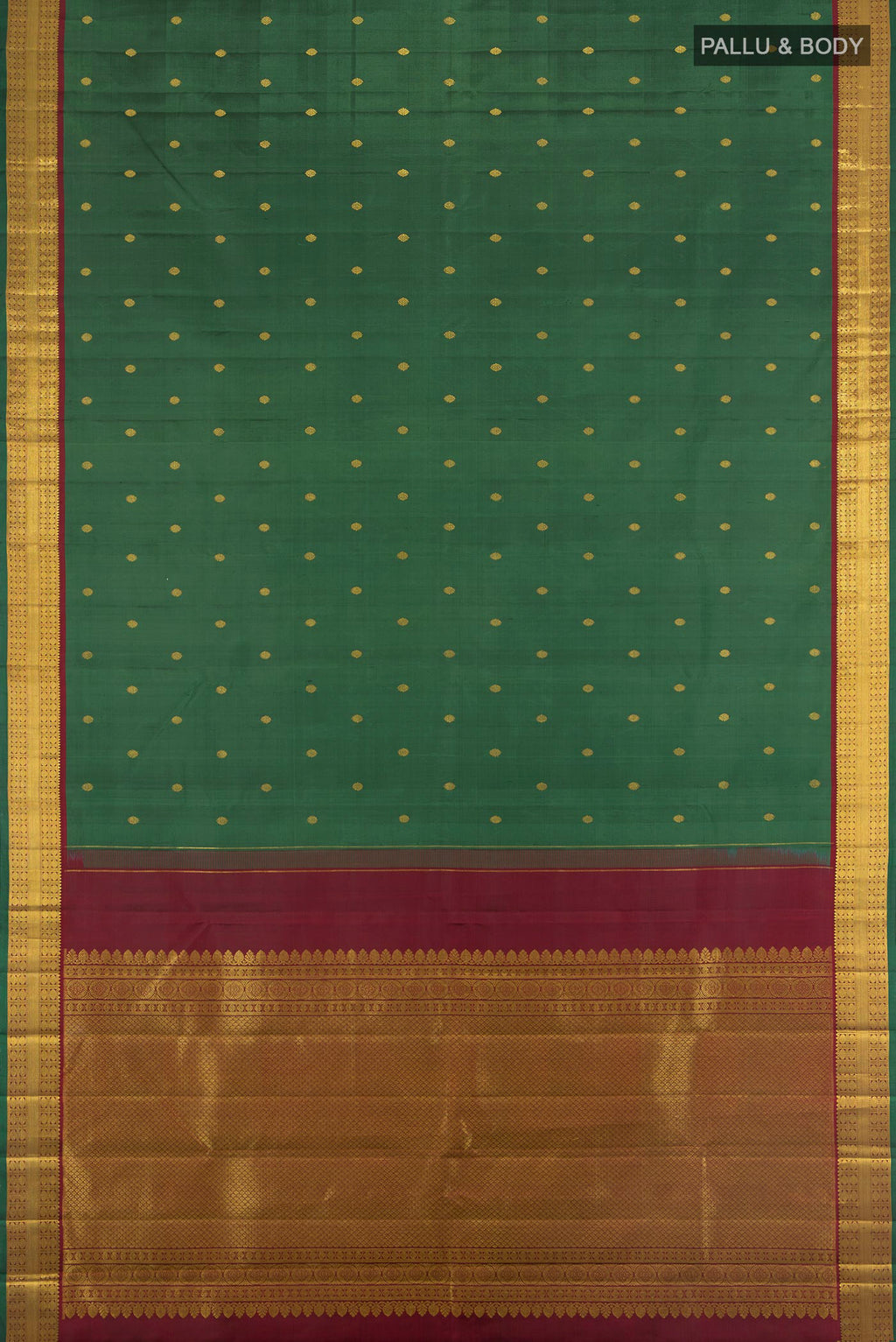 Flat view of Bottle Green Kanchipuram Silk Saree with Zari Butta on the body and Zari Border. 