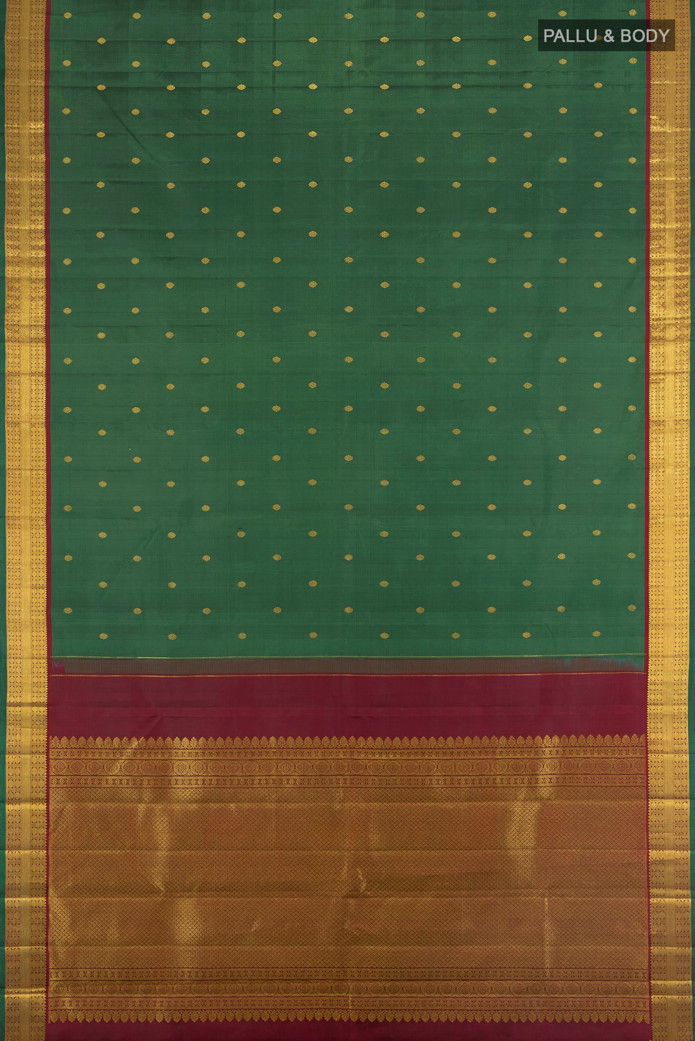 Flat view of Bottle Green Kanchipuram Silk Saree with Zari Butta on the body and Zari Border. 