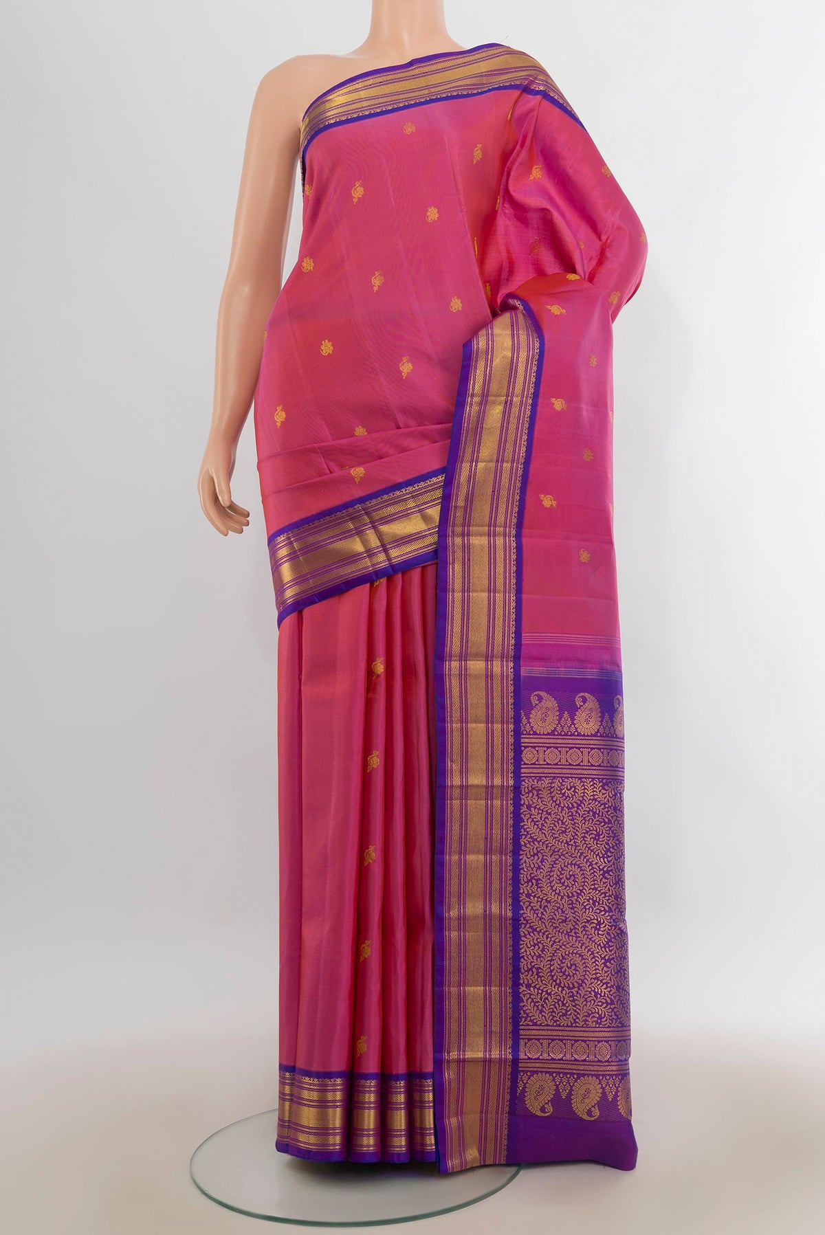 Pure Silk Pure Zari Rose pink Kanchipuram Saree with Zari Butta on the body and Zari Border.  displayed on a mannequin