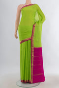 Parrot Green Mysore Crepe Saree with Plain Body and Zari Border.  displayed on a mannequin