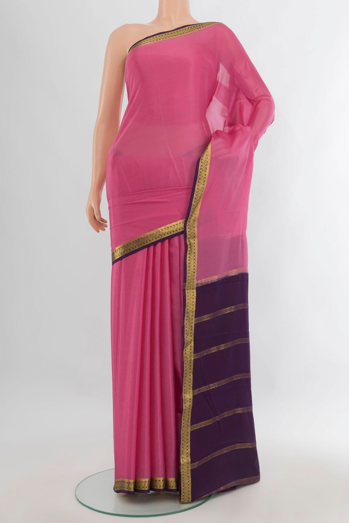 Rose pink Mysore Crepe Saree with Plain Body and Zari Border.  displayed on a mannequin