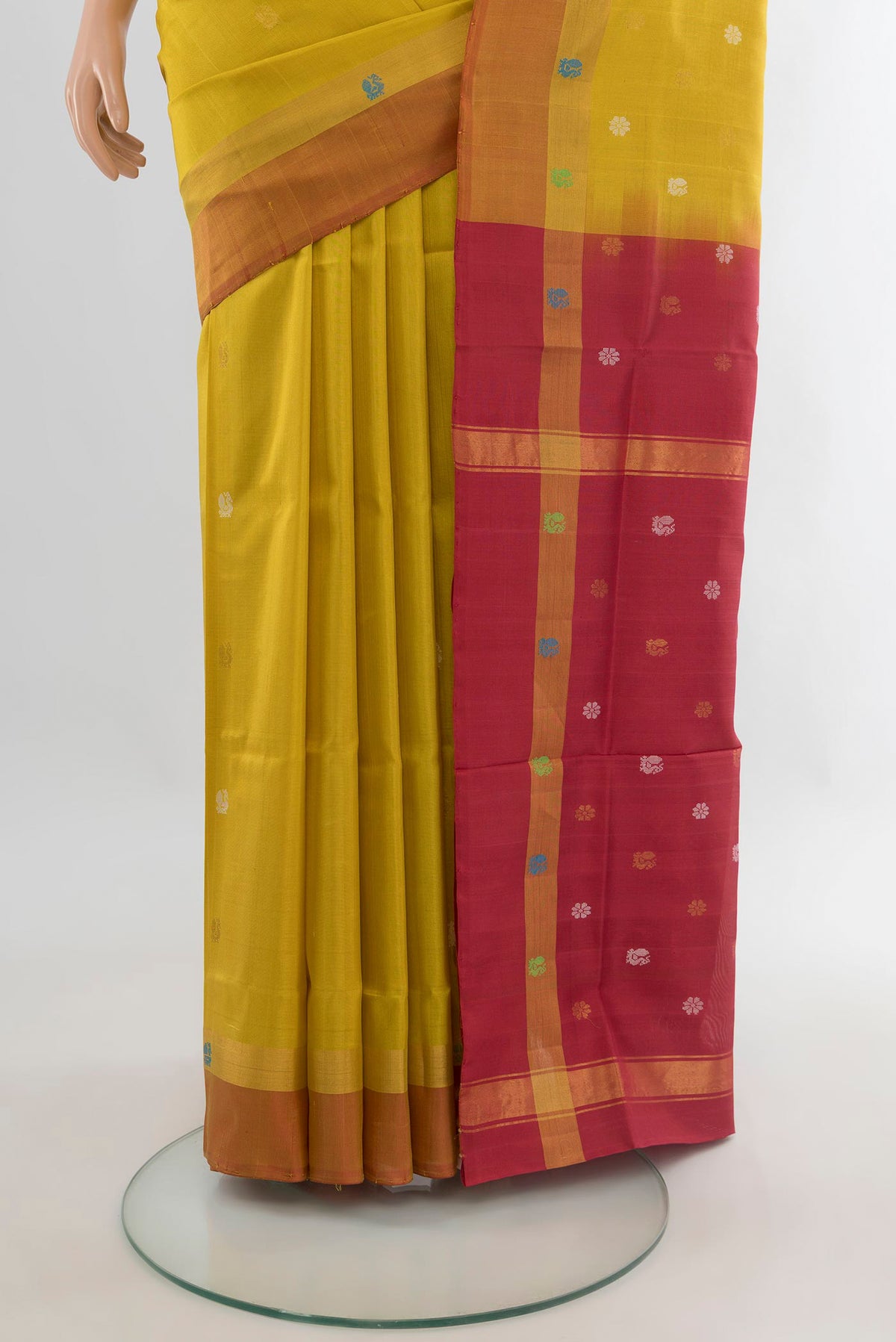 Pleats and pallu of Pure Silk Lemon Yellow Uppada Saree with Zari Butta on the body and Zari Border. 