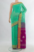 Pure Silk Green Uppada Saree with Zari Butta on the body and Zari Border.  displayed on a mannequin