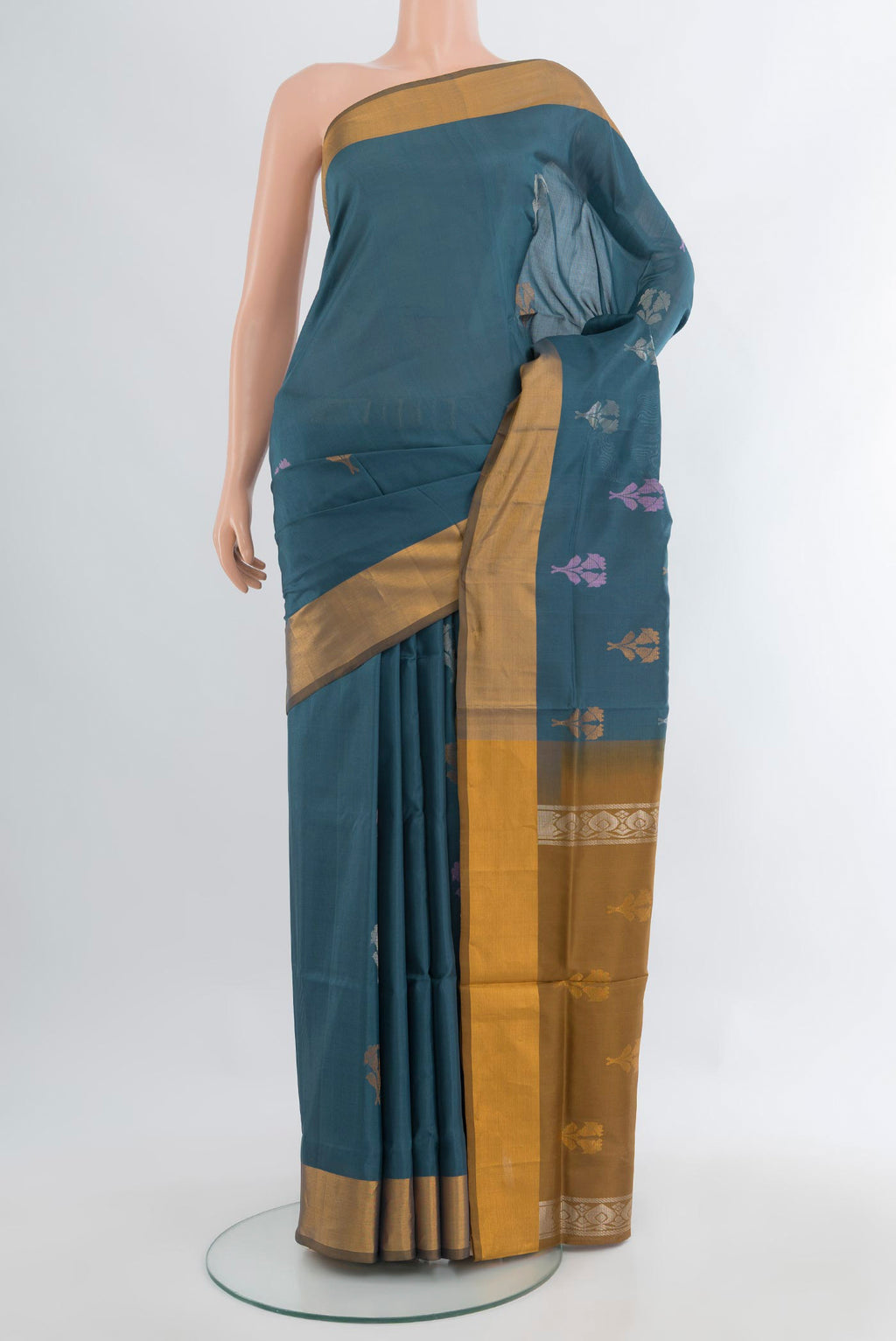Blue Grey Uppada Silk Saree with Zari Butta on the body and Zari Border.  displayed on a mannequin