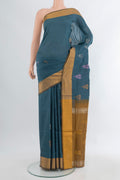 Blue Grey Uppada Silk Saree with Zari Butta on the body and Zari Border.  displayed on a mannequin