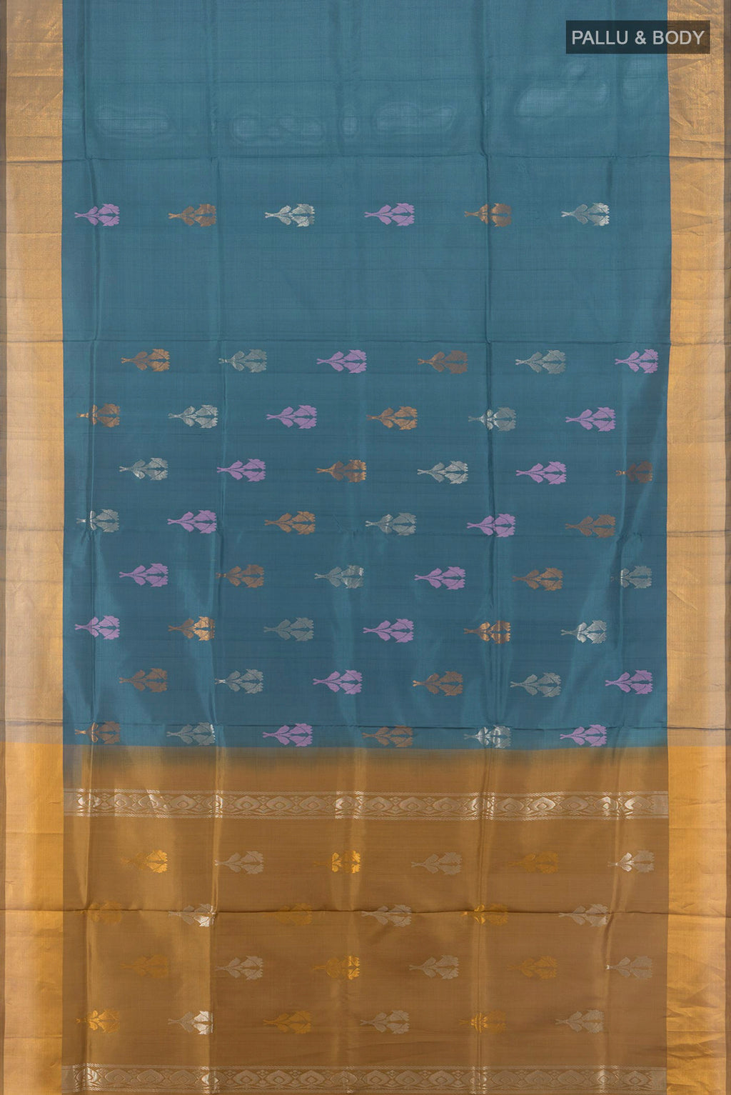 Flat view of Blue Grey Uppada Silk Saree with Zari Butta on the body and Zari Border. 