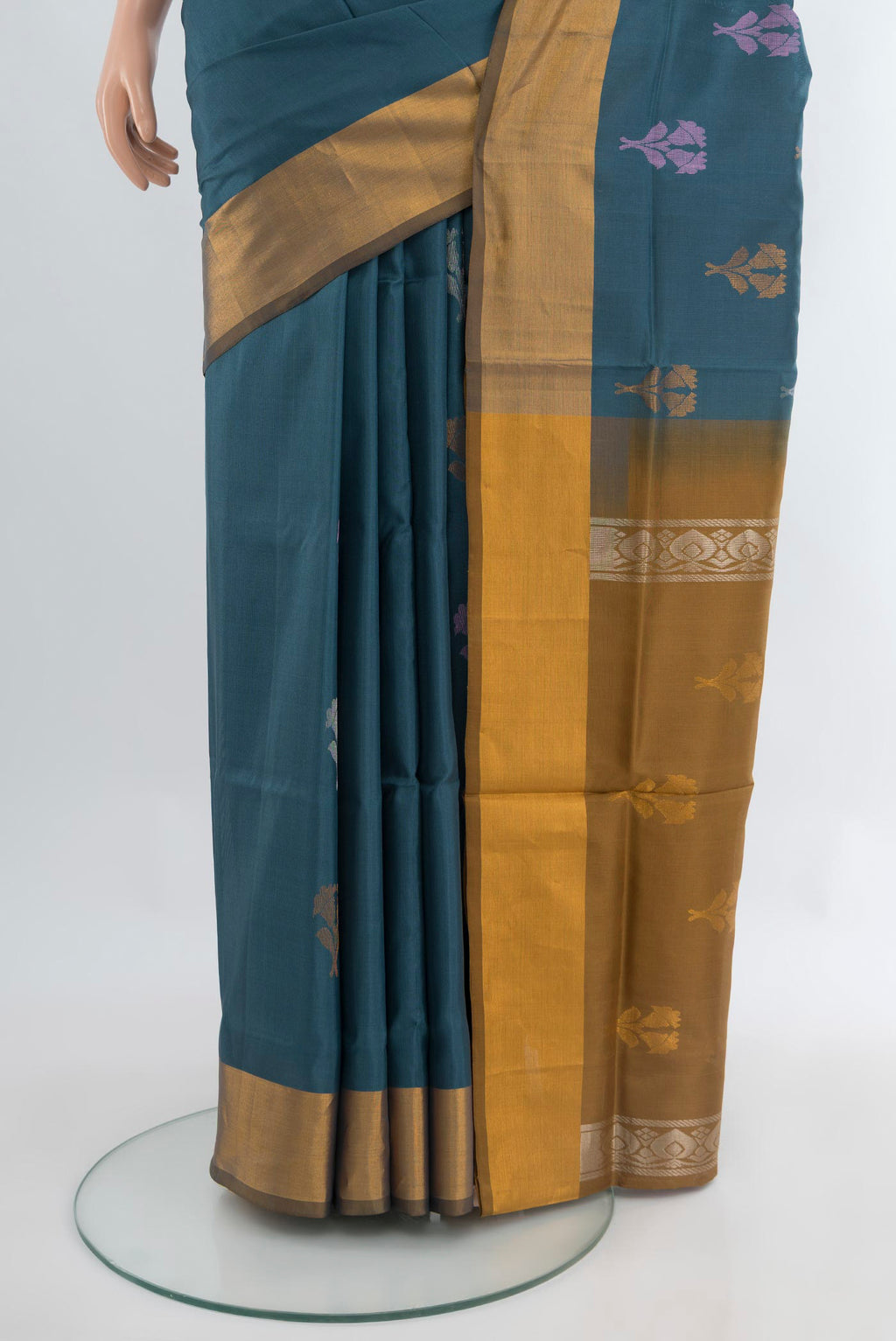 Pleats and pallu of Blue Grey Uppada Silk Saree with Zari Butta on the body and Zari Border. 