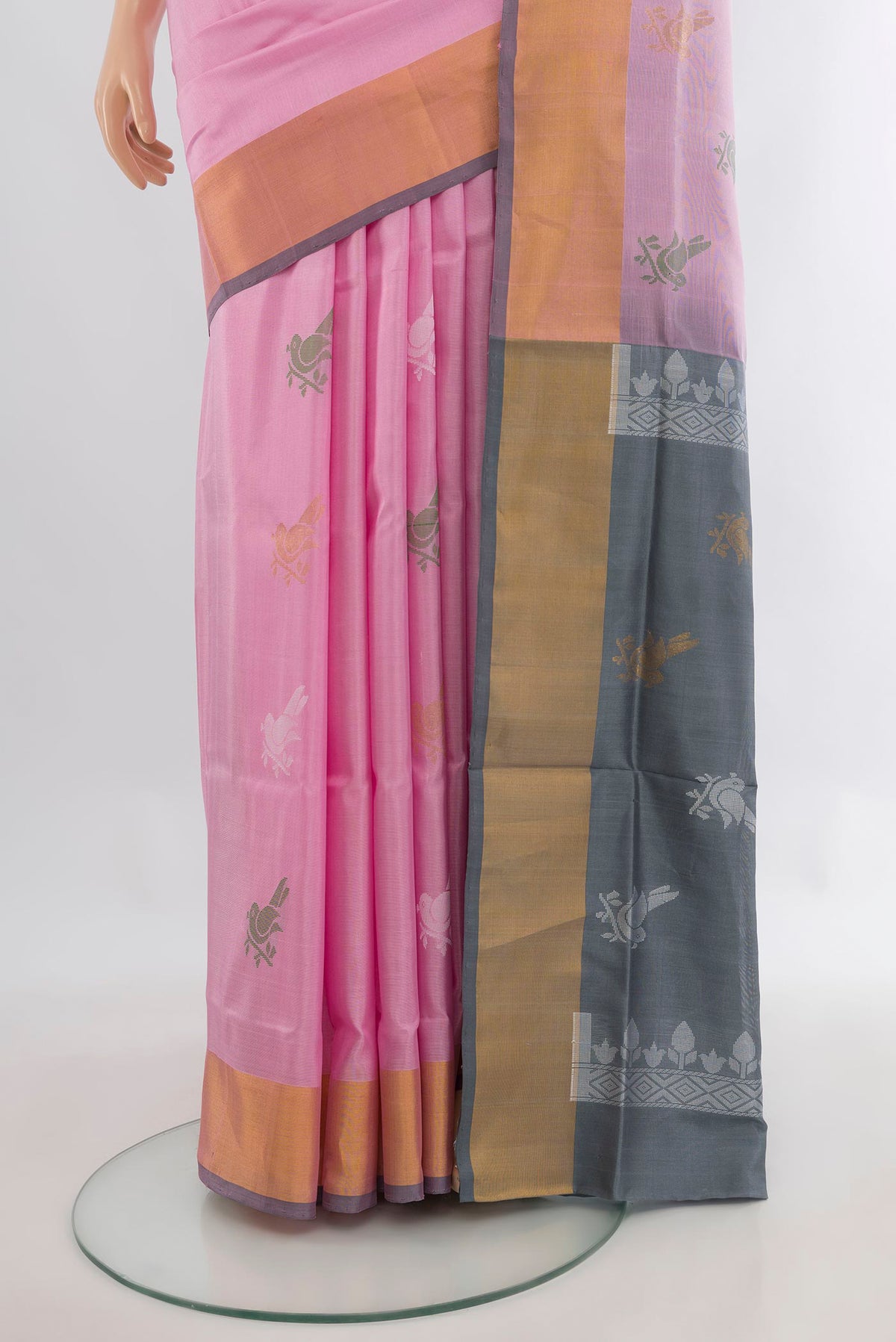 Pleats and pallu of Pure Silk Rose pink Uppada Saree with Zari Butta on the body and Zari Border. 