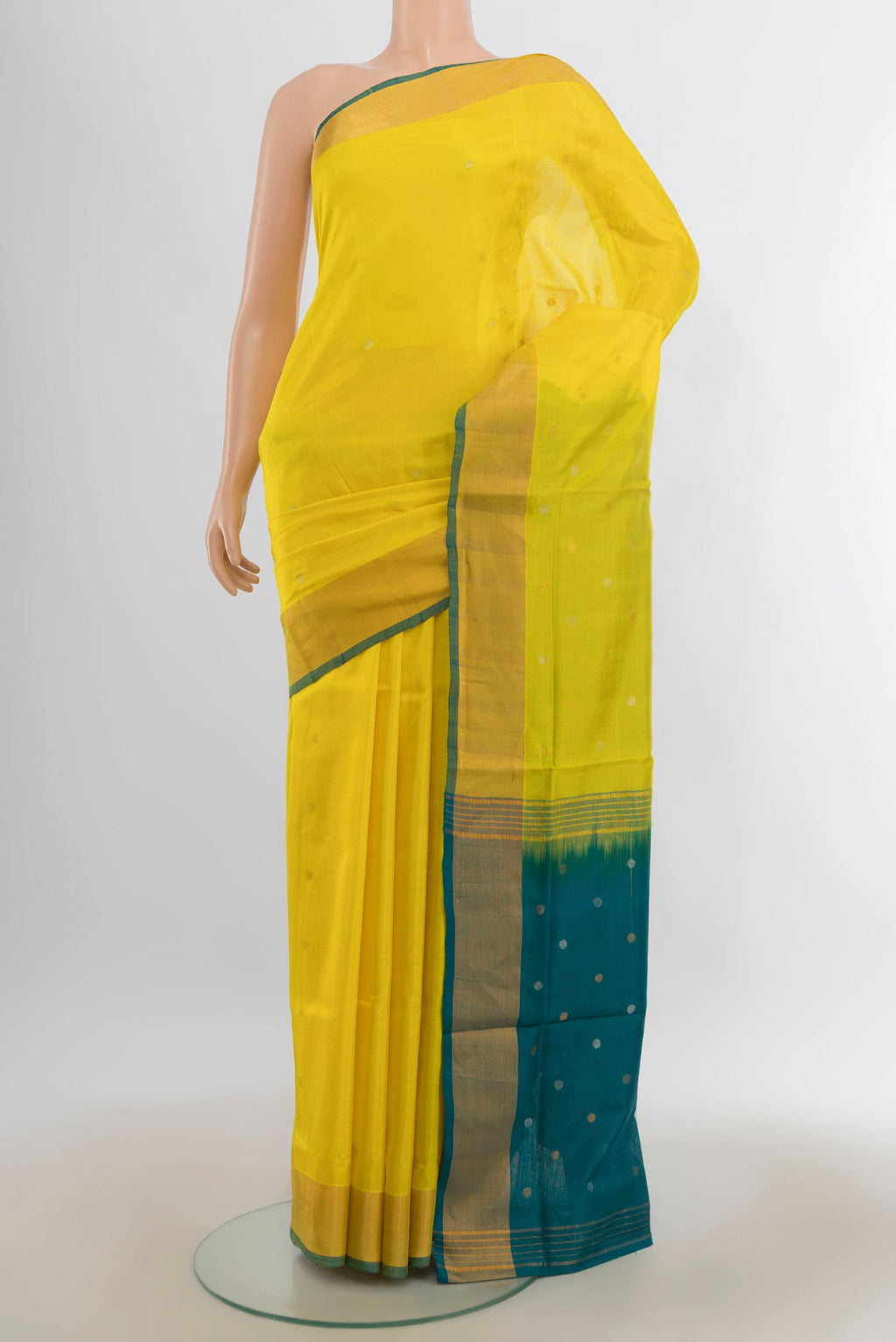 Pure Silk Lemon Yellow Uppada Saree with Zari Butta on the body and Zari Border.  displayed on a mannequin