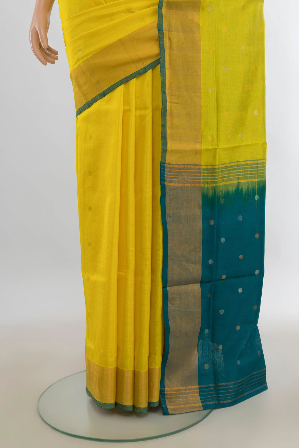 Pleats and pallu of Pure Silk Lemon Yellow Uppada Saree with Zari Butta on the body and Zari Border. 