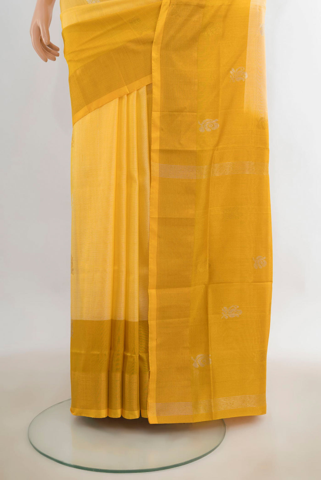 Pleats and pallu of Pure Silk Yellow Uppada Saree with Zari Butta on the body and Zari Border. 