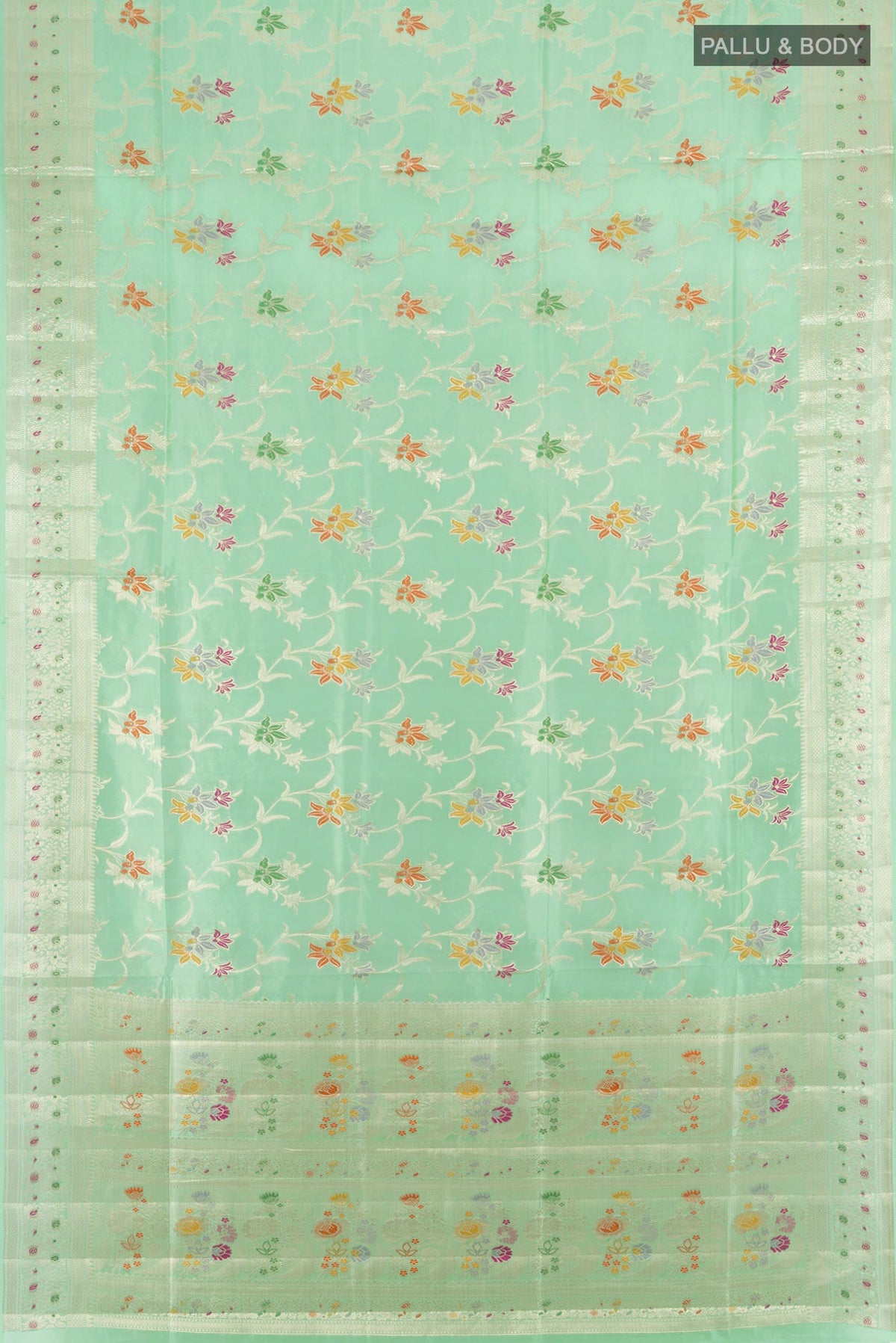 Flat view of Pure Silk Mint Green Banarasi Raw Saree with Zari And Thread Butta on the body and Zari Border. 