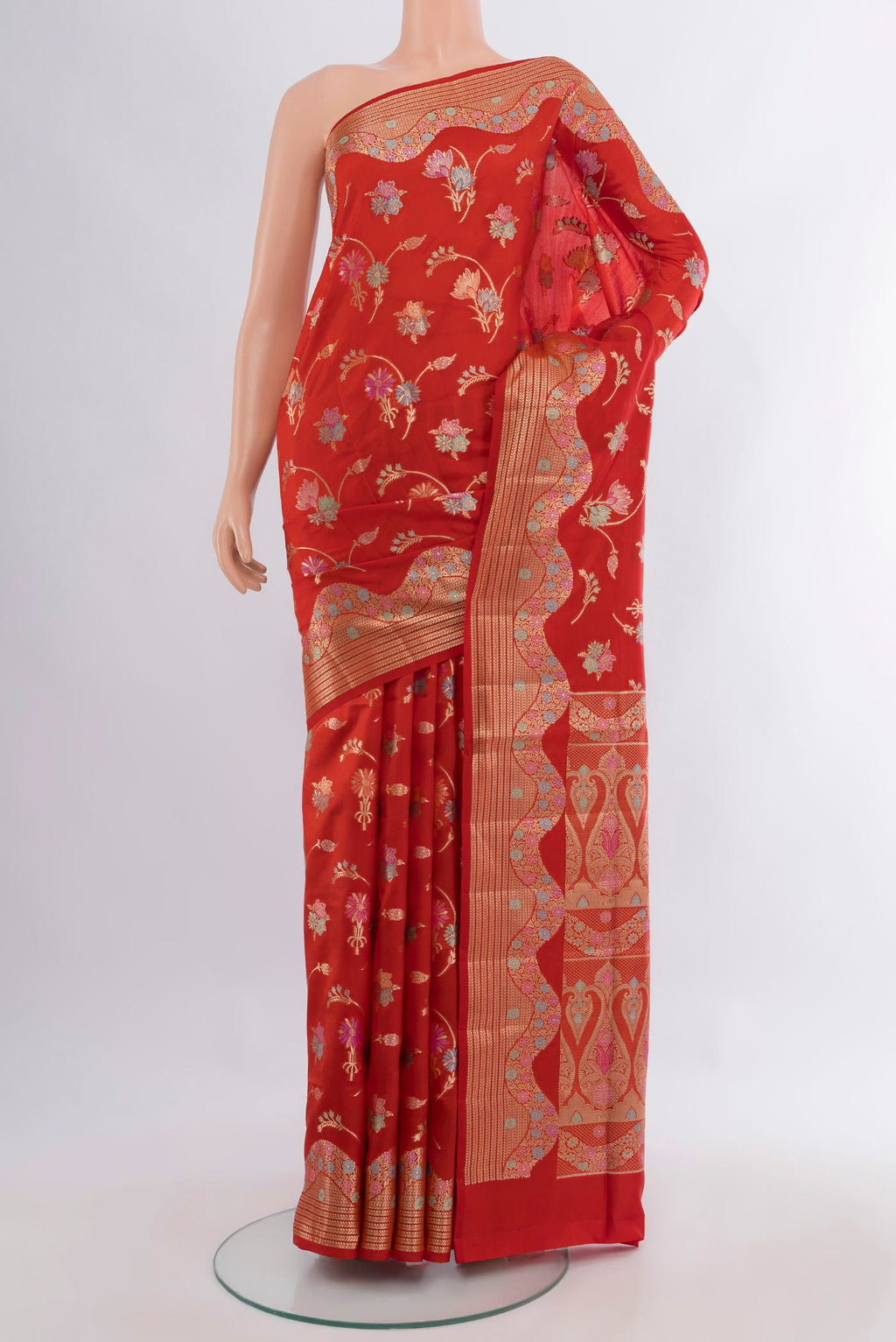 Pure Silk Red Banarasi Raw Saree with Zari Butta on the body and Zari Border.  displayed on a mannequin