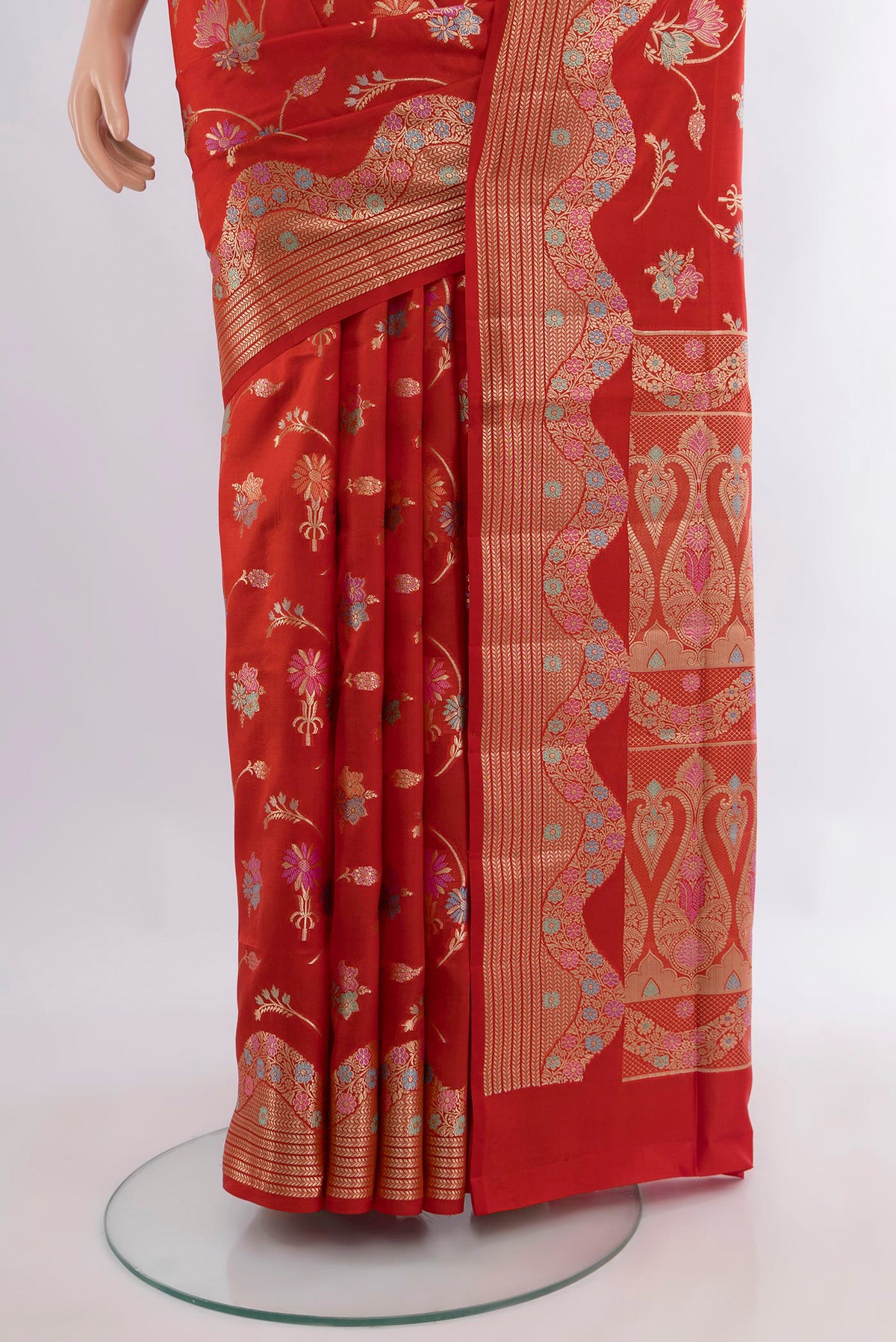 Pleats and pallu of Pure Silk Red Banarasi Raw Saree with Zari Butta on the body and Zari Border. 