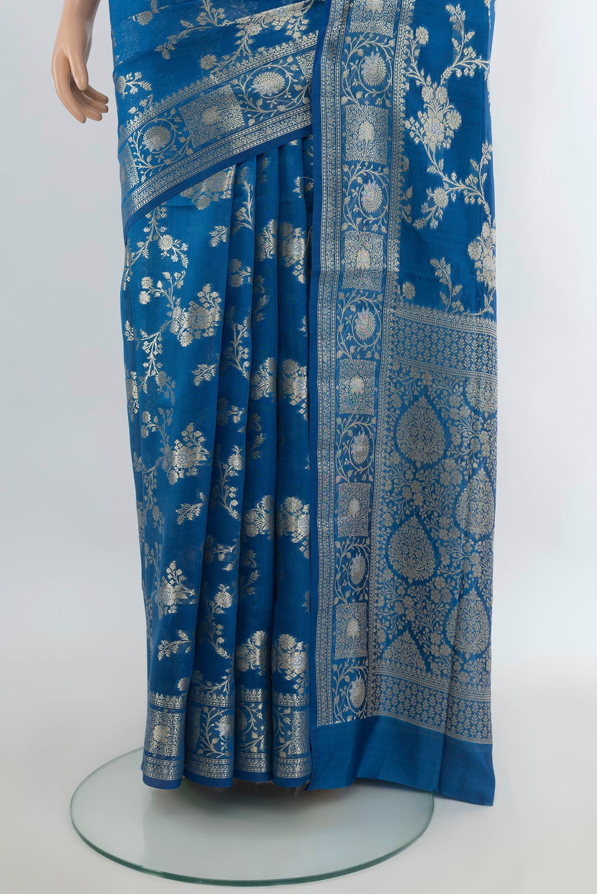 Pleats and pallu of Pure Silk Light Blue Banarasi Raw Saree with Zari Butta on the body and Zari Border. 