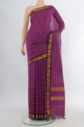 Pure Silk Purple Kanjivaram Saree with Stripes on the body and Zari Border.  displayed on a mannequin