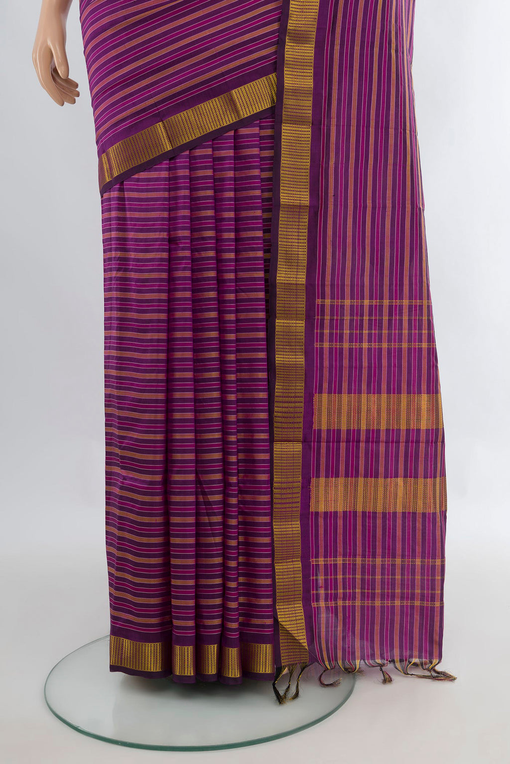 Pleats and pallu of Pure Silk Purple Kanjivaram Saree with Stripes on the body and Zari Border. 