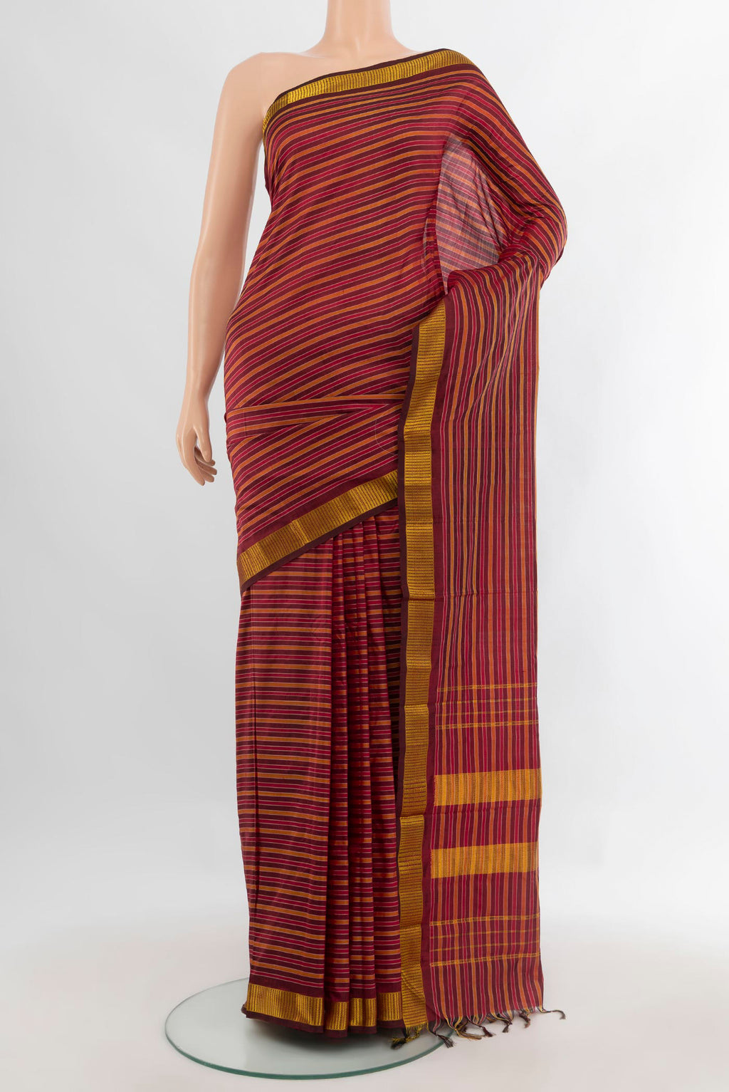 Pure Silk Maroon Kanjivaram Saree with Stripes on the body and Zari Border.  displayed on a mannequin