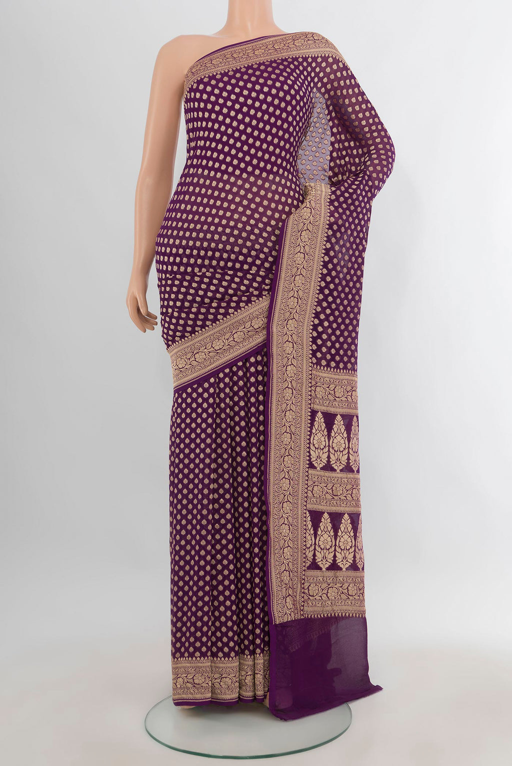 Violet Banarasi Georgette Saree with Zari Butta on the body and Zari Border.  displayed on a mannequin