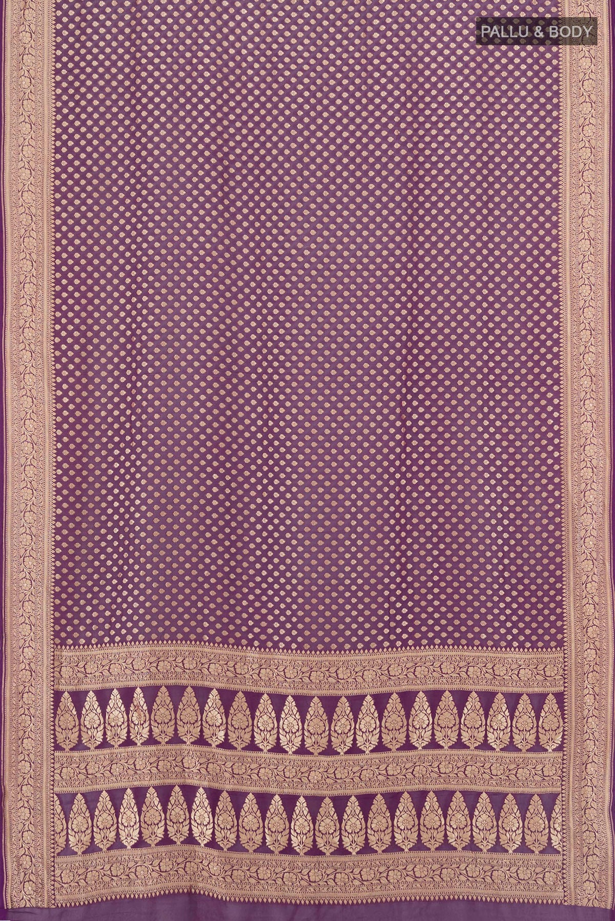 Flat view of Violet Banarasi Georgette Saree with Zari Butta on the body and Zari Border. 