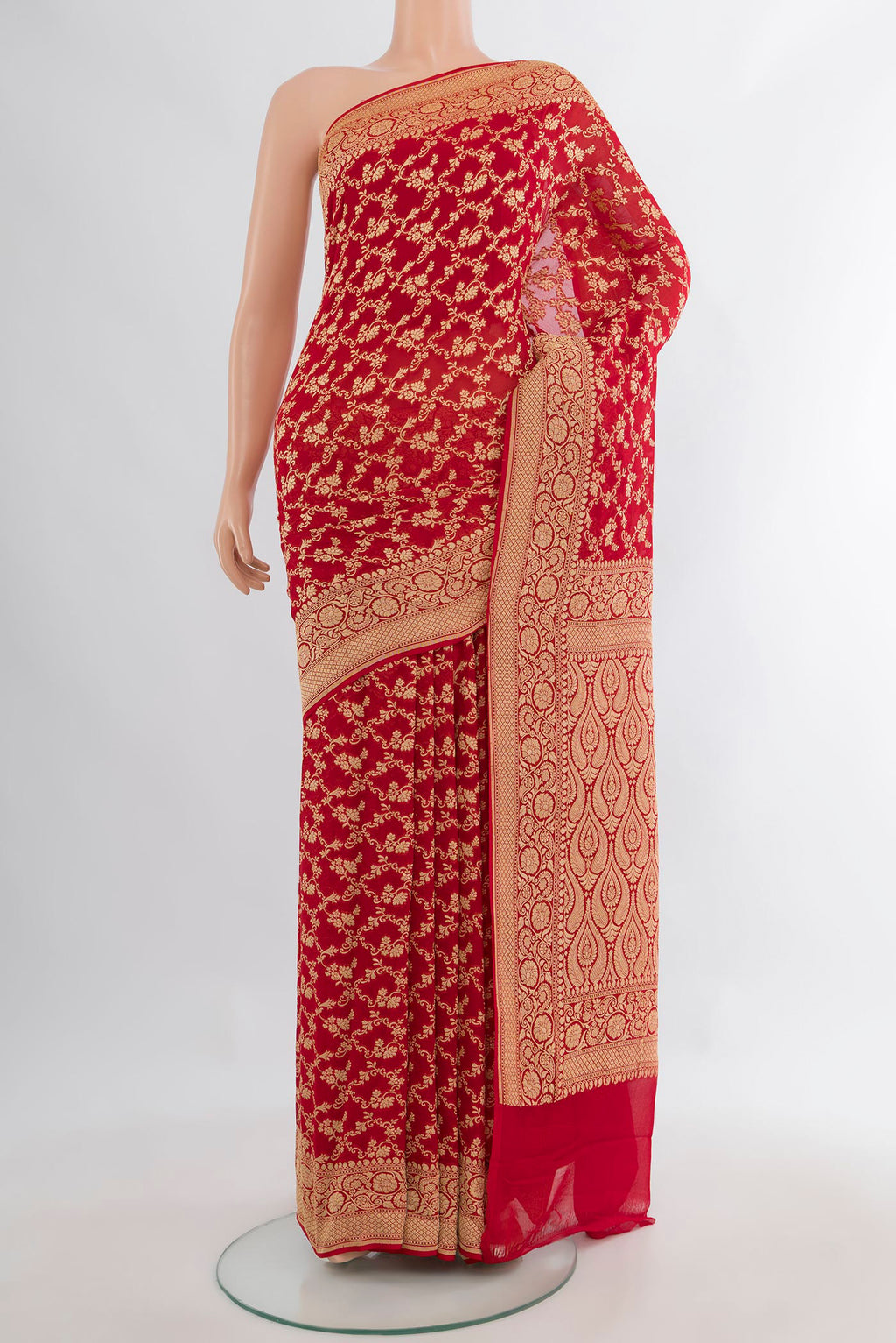 Red Banarasi Georgette Saree with Zari Brocade on the body and Zari Border.  displayed on a mannequin
