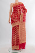 Red Banarasi Georgette Saree with Zari Brocade on the body and Zari Border.  displayed on a mannequin