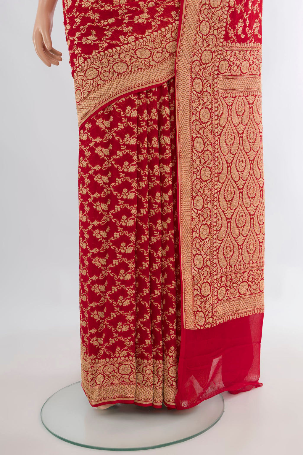 Pleats and pallu of Red Banarasi Georgette Saree with Zari Brocade on the body and Zari Border. 