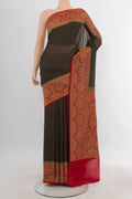 Black Banarasi Georgette Saree with Zari Butta on the body and Zari Border.  displayed on a mannequin
