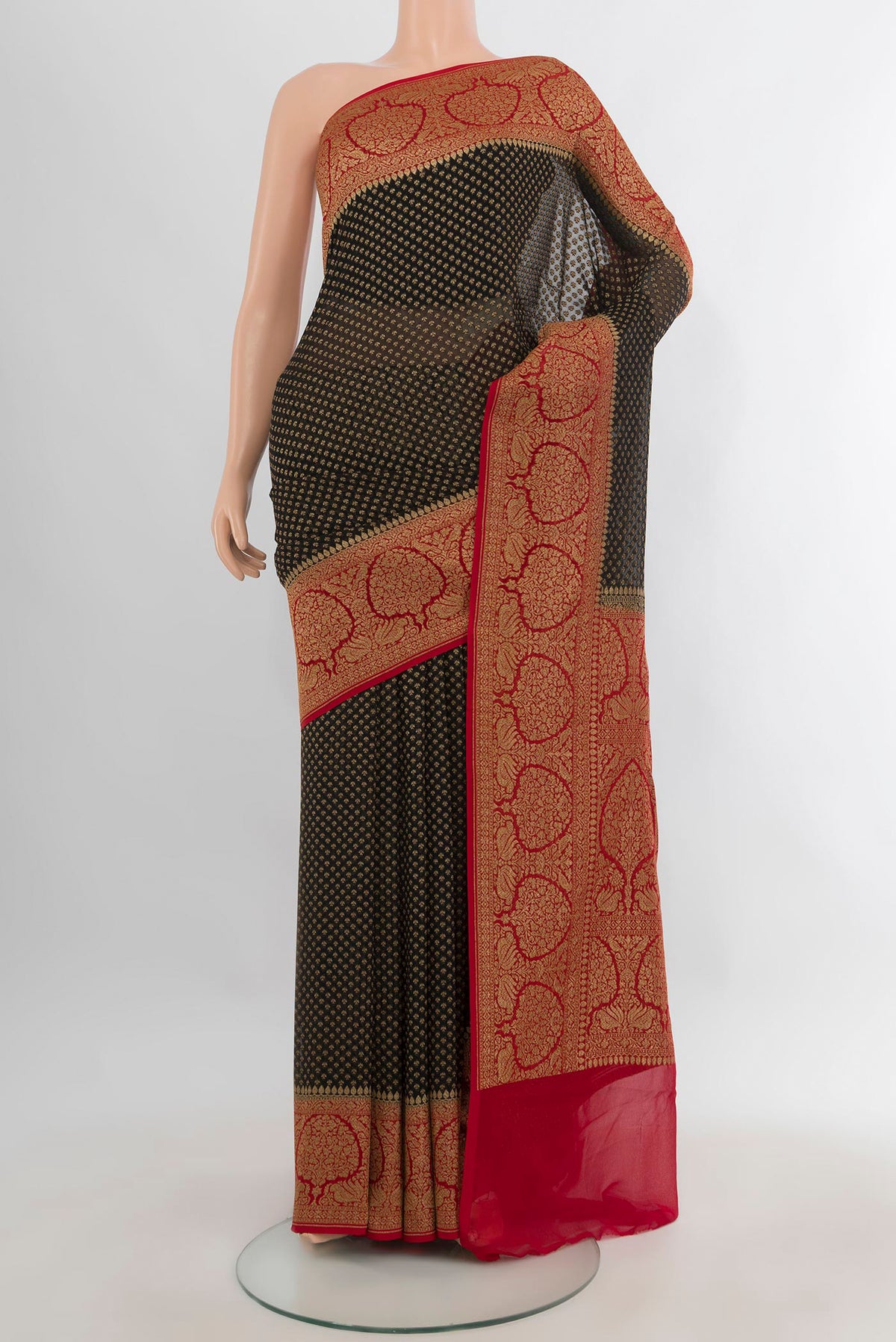 Black Banarasi Georgette Saree with Zari Butta on the body and Zari Border.  displayed on a mannequin