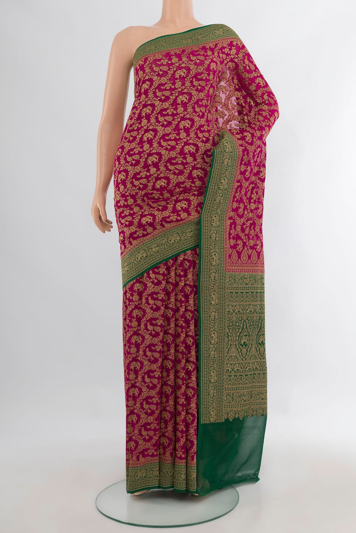 Dark Pink Banarasi Georgette Saree with Zari Brocade on the body and Zari Border.  displayed on a mannequin