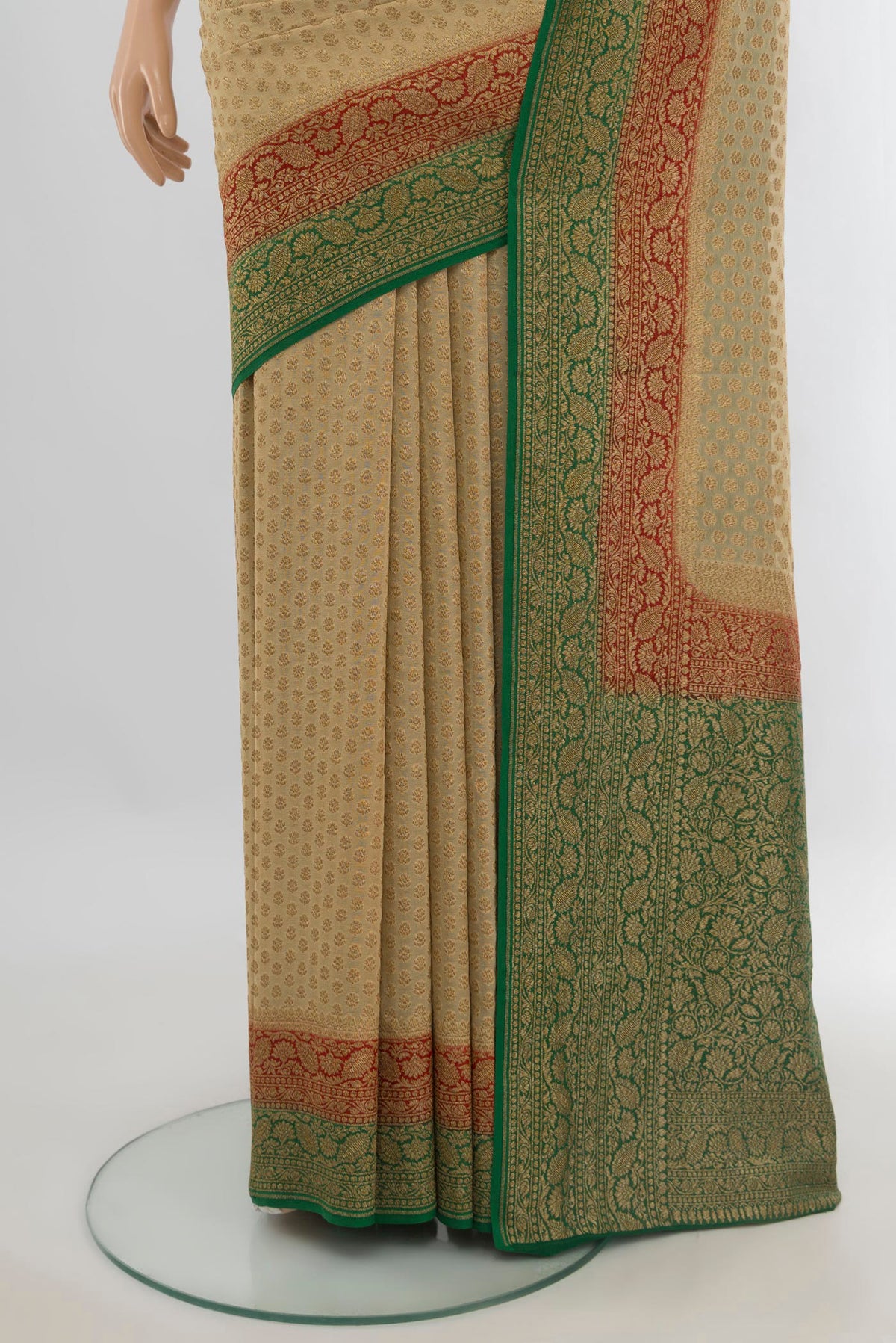 Pleats and pallu of Beige Banarasi Georgette Saree with Zari Brocade on the body and Zari Border. 