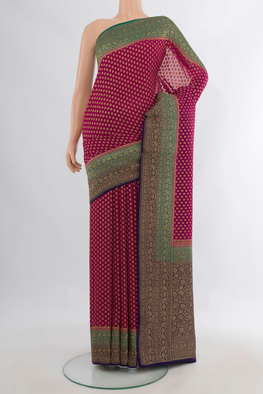 Dark Pink Banarasi Georgette Saree with Zari Brocade on the body and Zari Border.  displayed on a mannequin