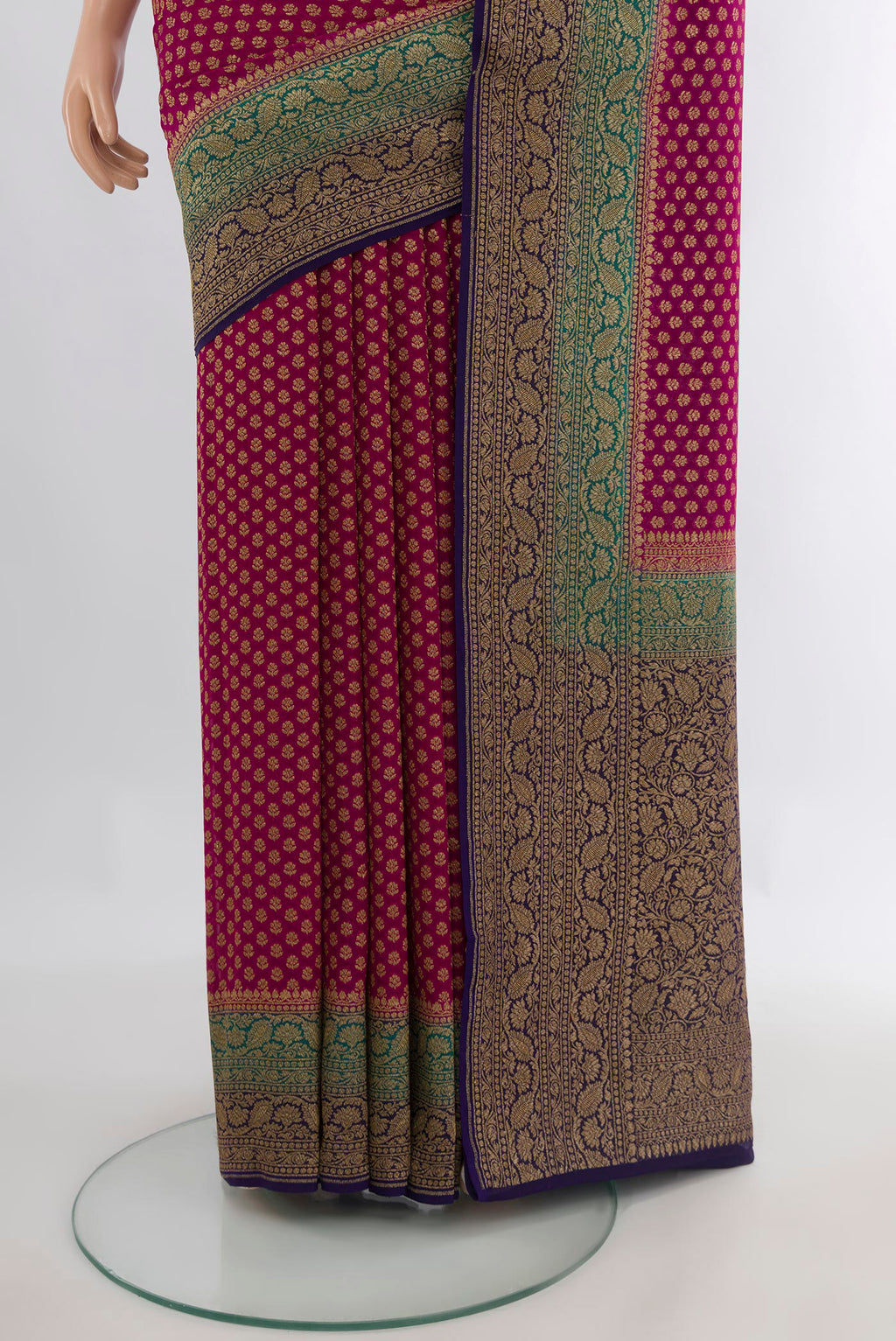 Pleats and pallu of Dark Pink Banarasi Georgette Saree with Zari Brocade on the body and Zari Border. 