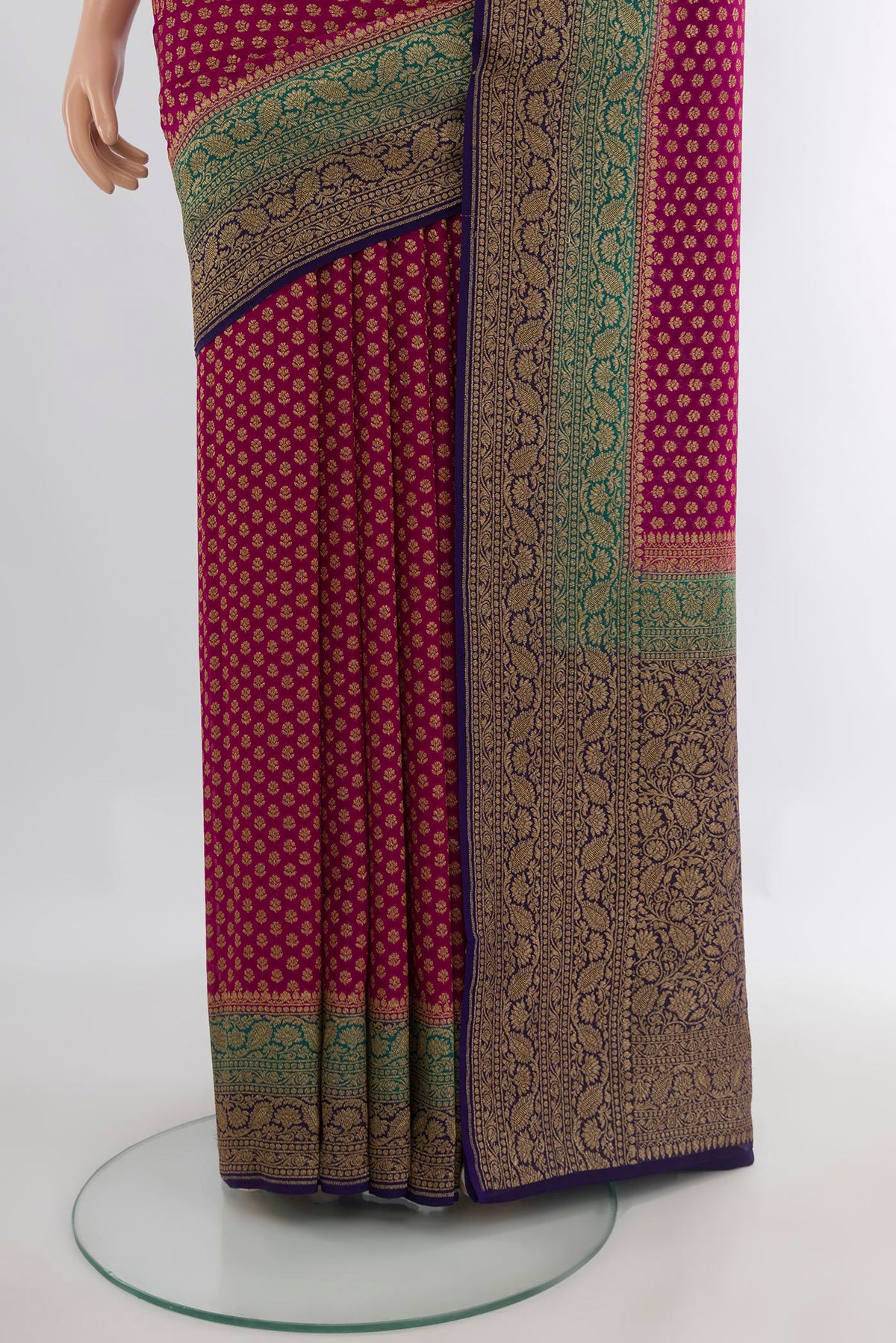 Pleats and pallu of Dark Pink Banarasi Georgette Saree with Zari Brocade on the body and Zari Border. 