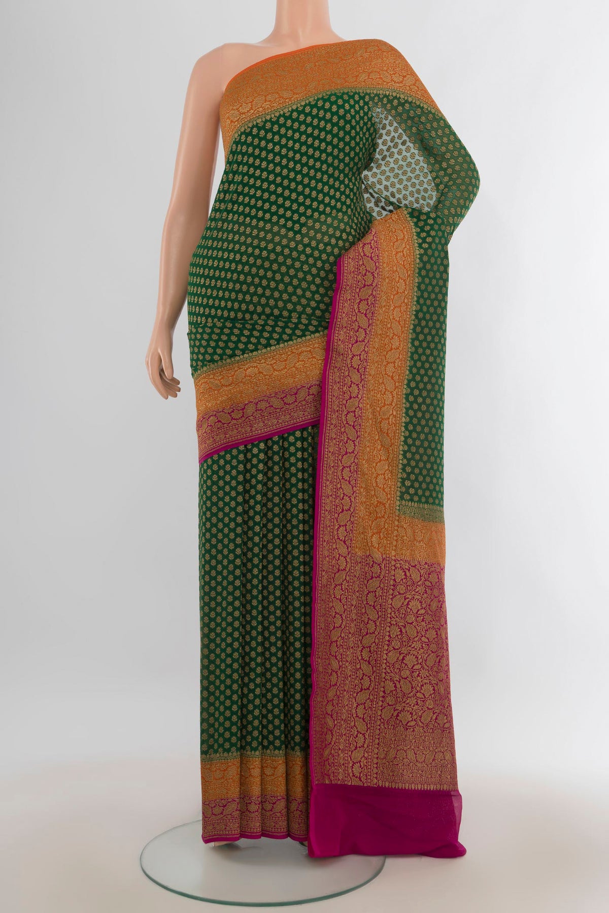 Multi Color Banarasi Georgette Saree with Zari Butta on the body and Silk Border.  displayed on a mannequin