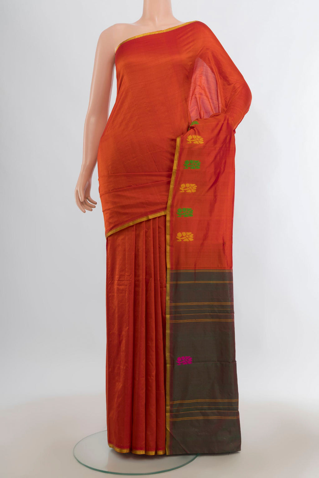 Pure Silk Orange Kanchipuram Saree with Plain Body and Thread Border.  displayed on a mannequin