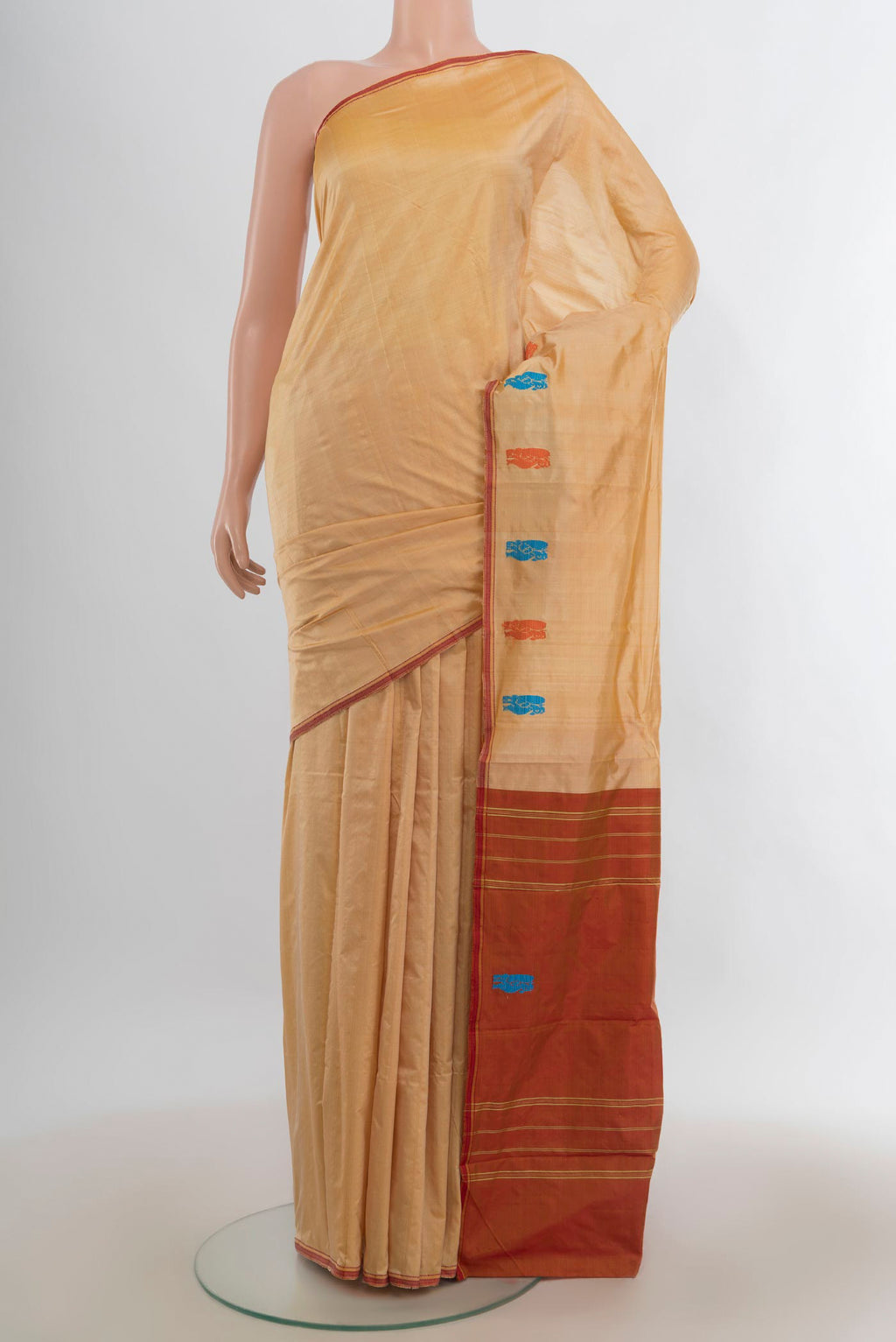 Pure Silk Sandal Kanchipuram Saree with Plain Body and Thread Border.  displayed on a mannequin