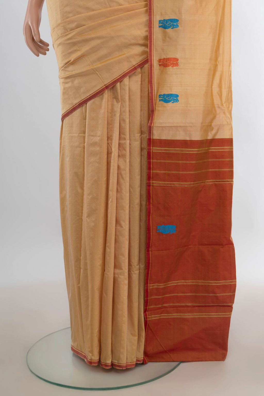 Pleats and pallu of Pure Silk Sandal Kanchipuram Saree with Plain Body and Thread Border. 