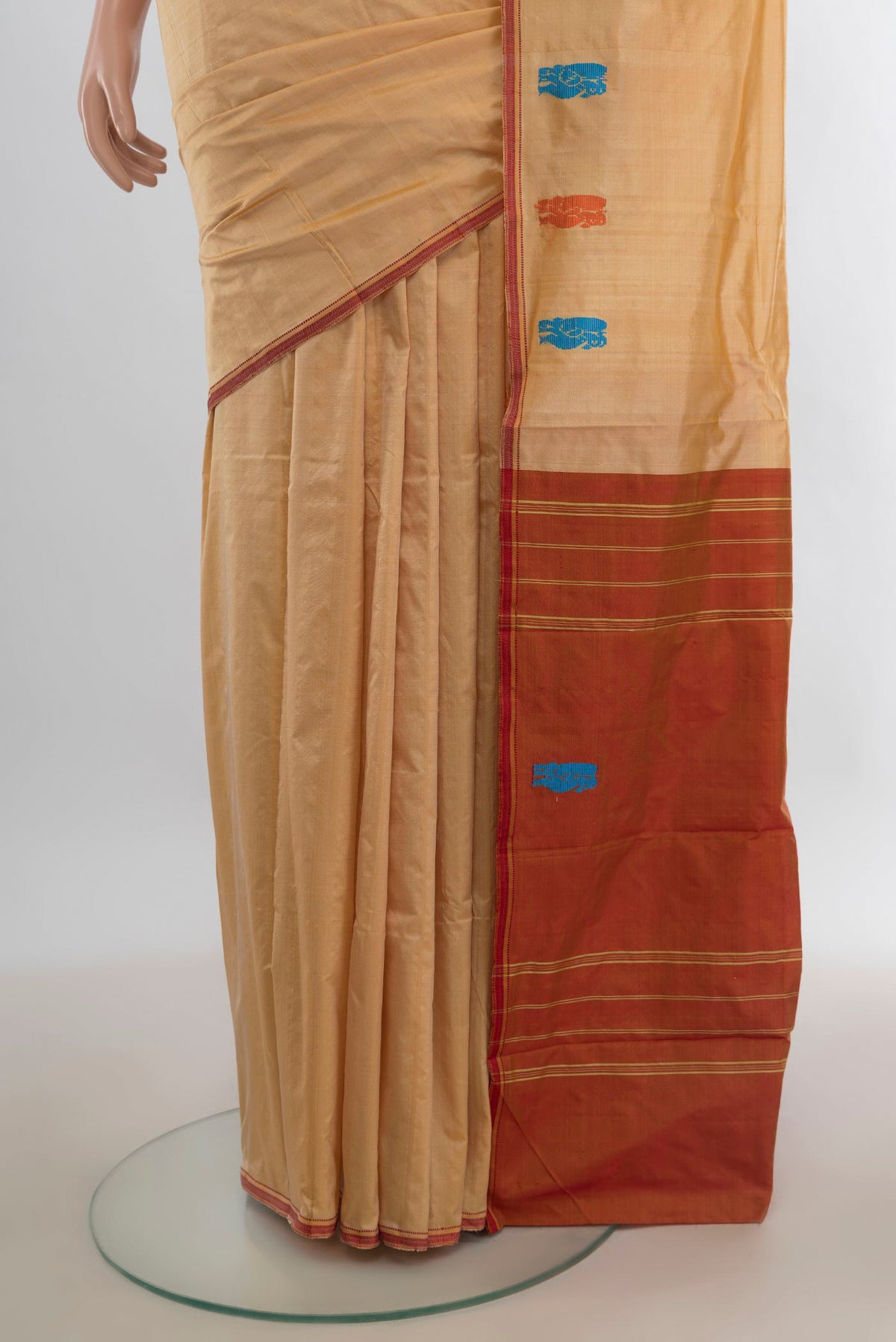 Pleats and pallu of Pure Silk Sandal Kanchipuram Saree with Plain Body and Thread Border. 
