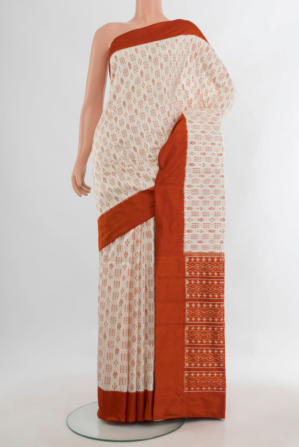 Pure Silk Cream Pochampally Saree with Pure Ikat on the body and Plain Border.  displayed on a mannequin